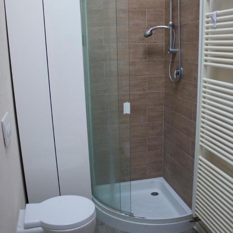 Corte Cavour. Una mansarda nel cuore della città - Two-Bedroom Apartment - 18