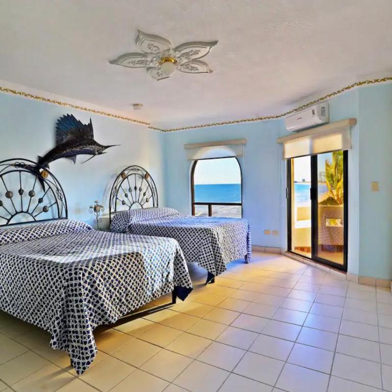 Frente al mar hermoso condominio familiar - Three-Bedroom Apartment - 18