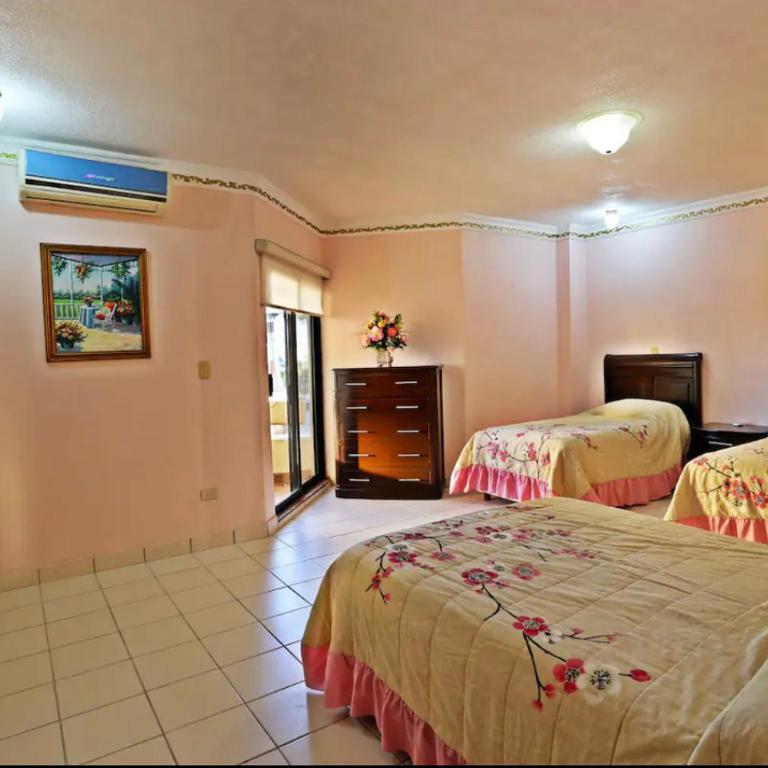 Frente al mar hermoso condominio familiar - Three-Bedroom Apartment - 25