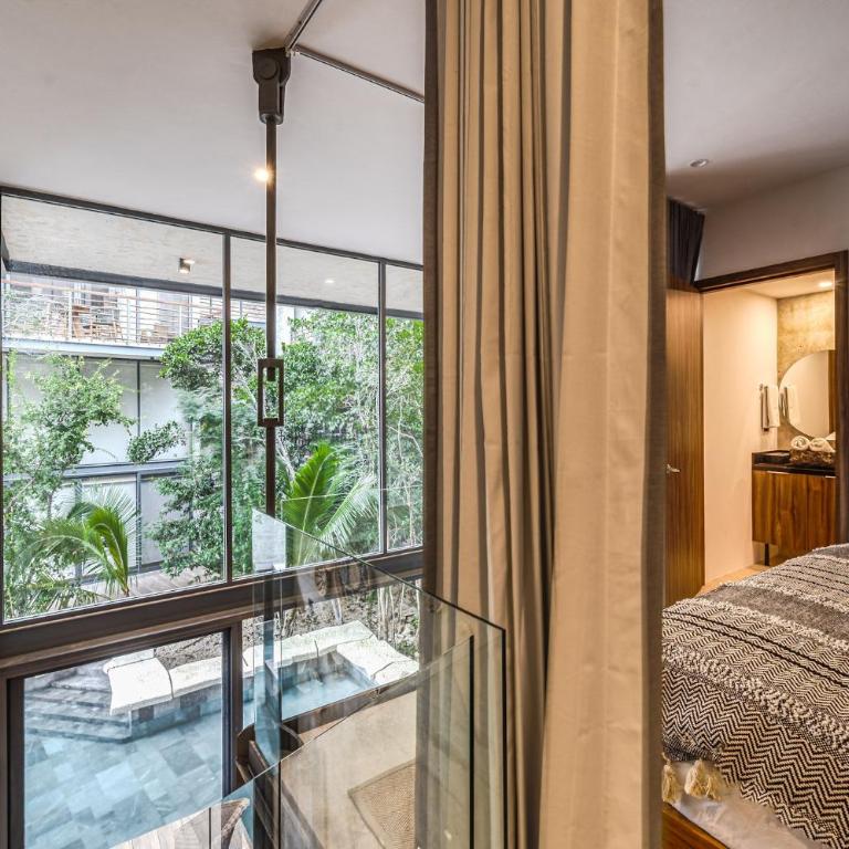 Hidden Swim up Loft w Cenote Rooftop Pool Gym - Apartamento de 1 dormitorio - 11