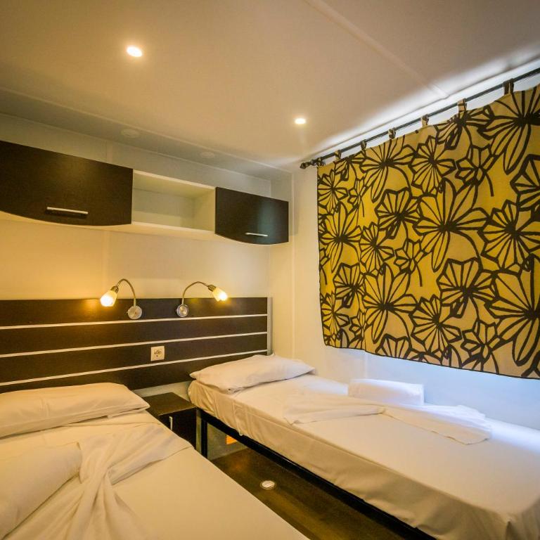 Tiliguerta Glamping&Camping Village - Casa Mobile con 3 Camere da Letto - 3