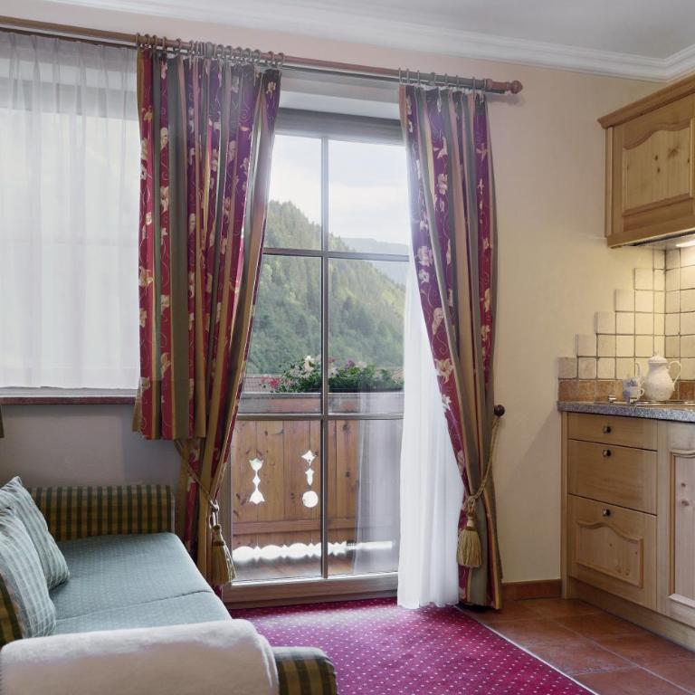 Landhotel Untermüllnergut - Apartment mit Blick auf die Berge - 4