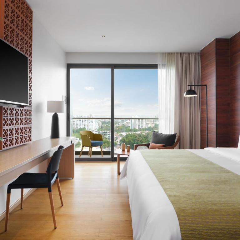 voco Guadalajara Neruda by IHG - Habitación Estándar con cama extragrande - Planta alta - 4