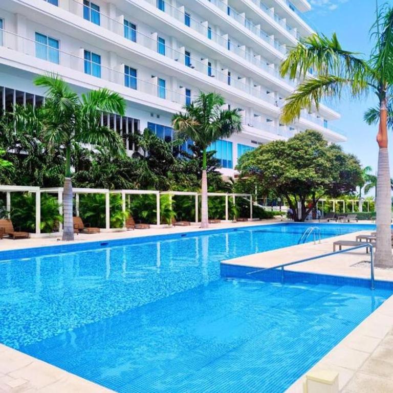 Edificio Playa dormida 2 con Piscina y playa - Three-Bedroom Apartment - 14