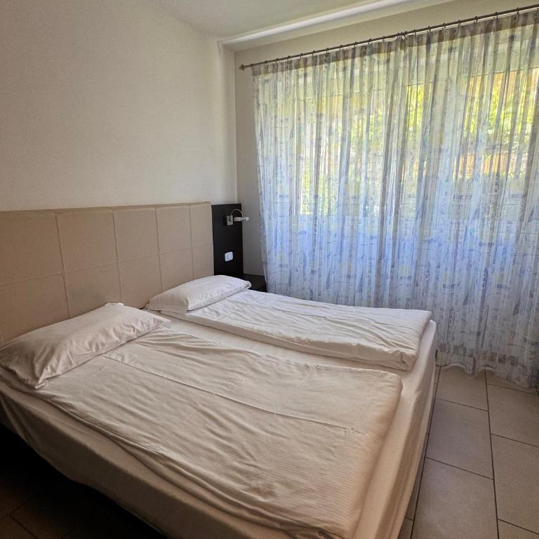Casa Piccola Family Apartments - Appartamento con 2 Camere da Letto e Vista Giardino - 16