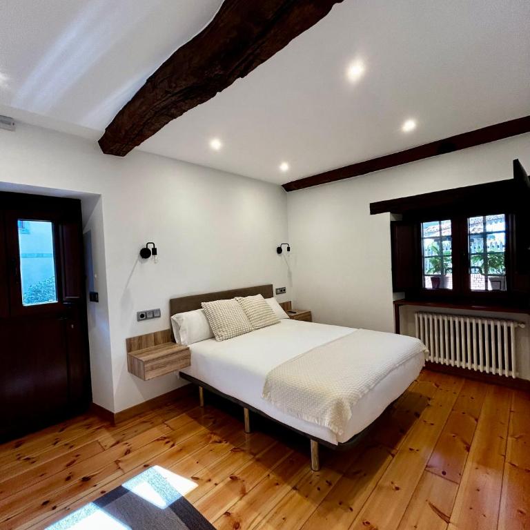 Apartamentos Rurales L'Arquera - Two-Bedroom Apartment with Garden View - 10