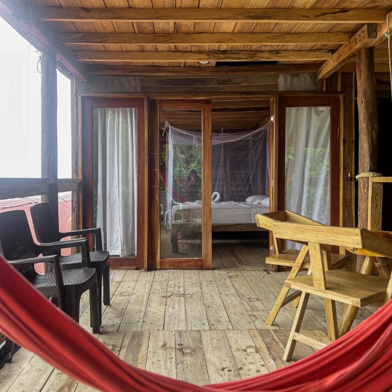 Hostal MOCAMBO BEACH - Habitación Triple con vistas al lago - 14
