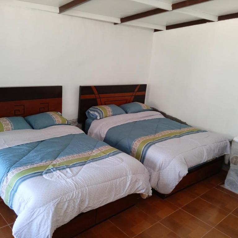 casa montañista lodge & camping - Habitación con cama extragrande y vistas al jardín - 8