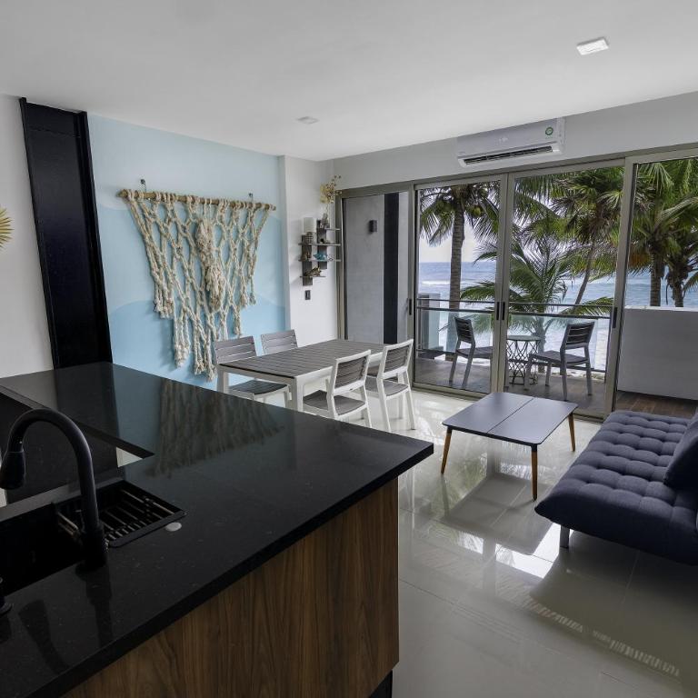 Angelina 28 Beachfront and Family Apartments - Modern and Relaxing Long Stays - 20 min from Cancun Airport - One-Bedroom Apartment with Sea View - 2