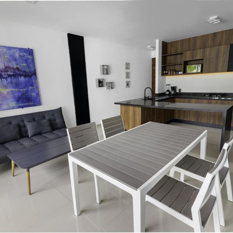 Angelina 28 Beachfront and Family Apartments - Modern and Relaxing Long Stays - 20 min from Cancun Airport - One-Bedroom Apartment with Sea View - 7