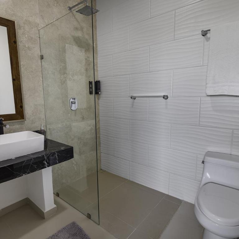 Angelina 28 Beachfront and Family Apartments - Modern and Relaxing Long Stays - 20 min from Cancun Airport - Two-Bedroom Apartment with Sea View - 7