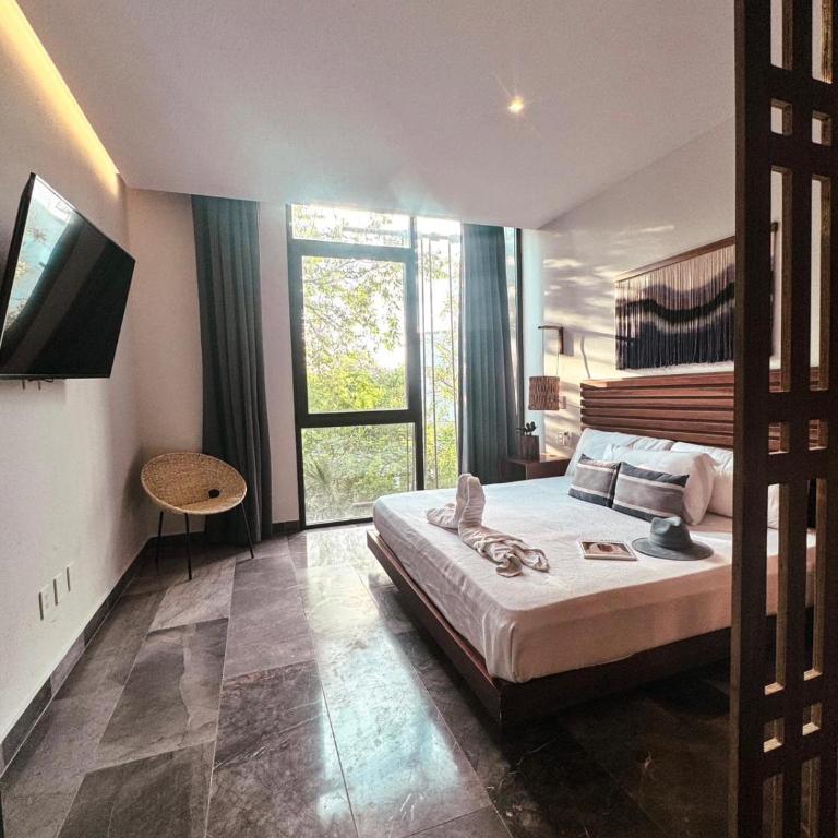 IIK Tulum by Groovy Stays- A Hip Condo-Hotel with WIFI, Rooftop, Pool, Sleeps 6 - Apartamento con terraza - 7