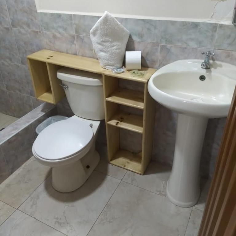 Hotel Cuencano Hogar - Habitación Cuádruple Deluxe - 1