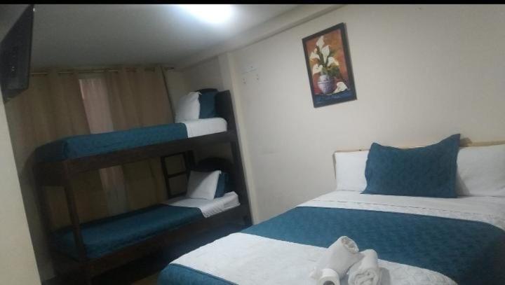 Hotel Cuencano Hogar - Habitación Cuádruple Deluxe - 5