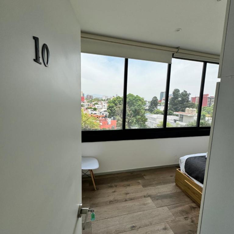 Calzolli Penthouse Casa de Huéspedes y Coliving - Double Room with Private Bathroom - 2