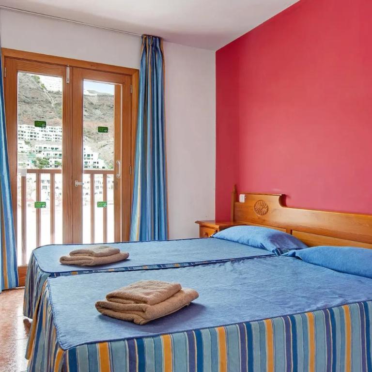 Apartamento económico con fibra rápida smart TV y terraza ideal familias Puerto Rico Montecarlo 11 - Apartamento de 2 dormitorios - 9