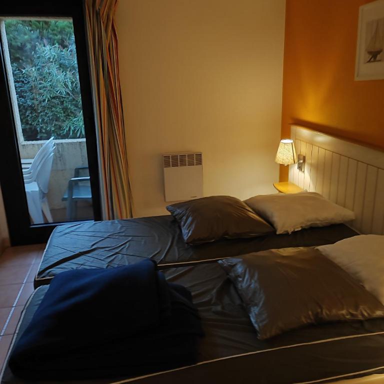 Le Cap d'Agde 2 pièces climatisé résidence Odalys St Loup en RDC avec terrasse - One-Bedroom Apartment - 20