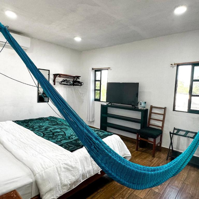 La Perle Noire - Dive Hotel Cozumel - Habitación con cama extragrande. - 14