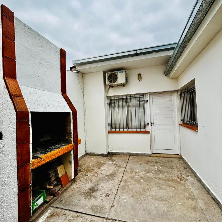 Departamento céntrico con cochera y patio con churrasquera - One-Bedroom Apartment - 10