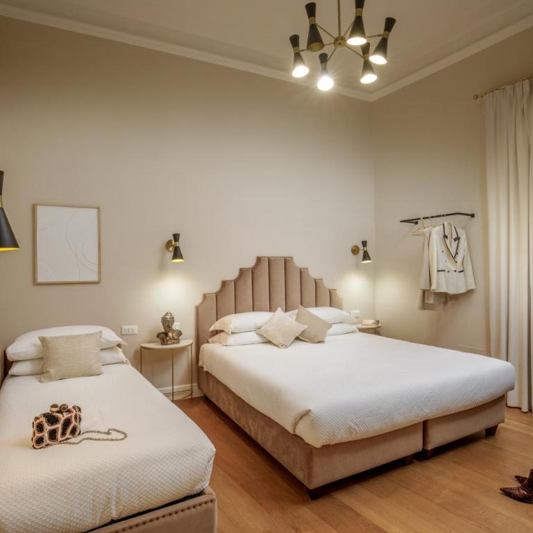 Daplace - Santa Susanna Suites - Camera Tripla - 1