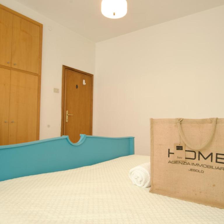 12 Accesso - Home Immobiliare Jesolo - Appartamento con 3 Camere da Letto - 20