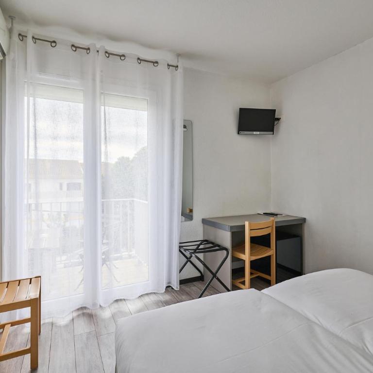 Hôtel Les Mimosas - Chambre Lits Jumeaux Confort avec Balcon et Climatisation - Côté Cour - 3
