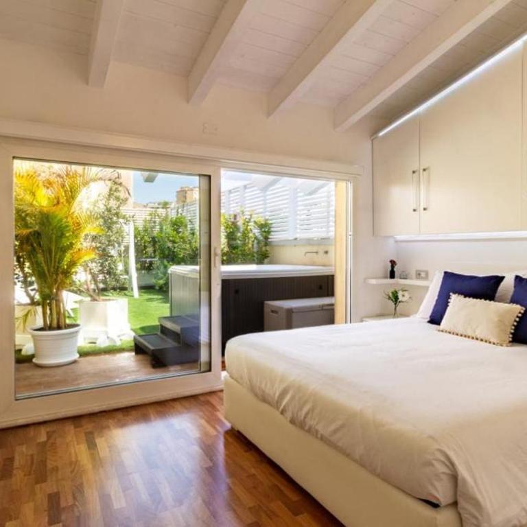 Attico New Bussola Cagliari - Appartamento con 1 Camera da Letto e Vasca Idromassaggio - 1