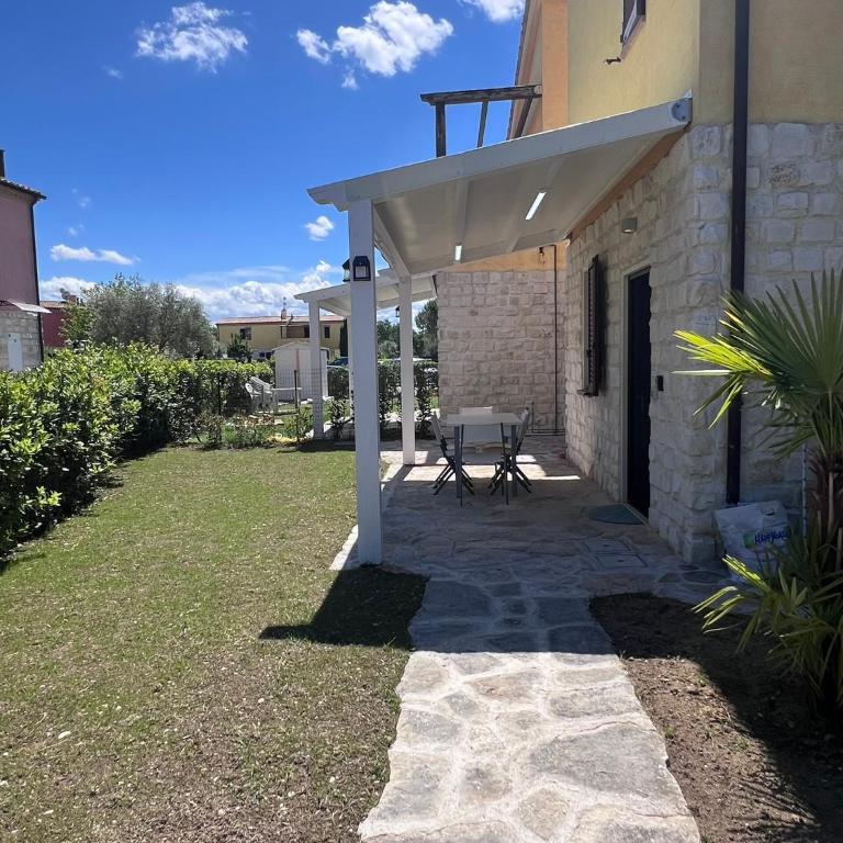 Casa Antia, nuovo bilocale con giardino in Residence con piscina - Casa Mobile - 1