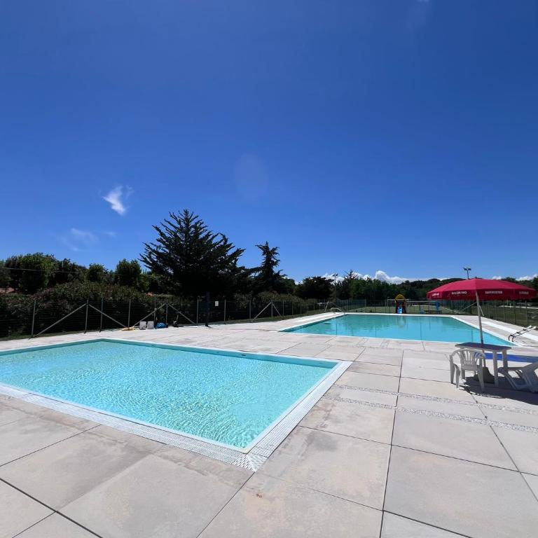 Casa Antia, nuovo bilocale con giardino in Residence con piscina - Casa Mobile - 6