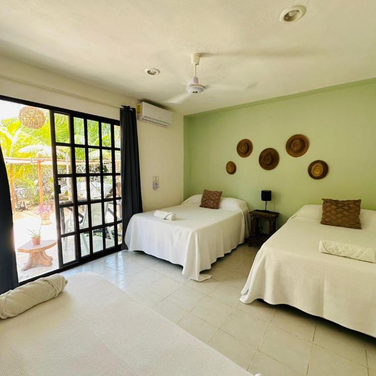Sirenas Caribbean Rooms Holbox - Habitación Cuádruple con terraza - 16