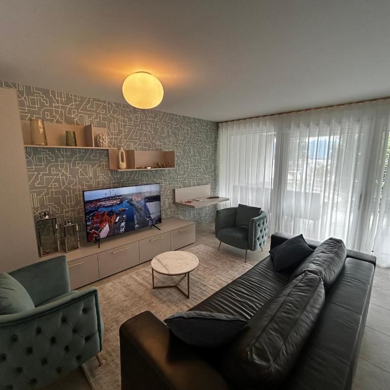 Family apartment, near the beach whit private park - Appartamento con 2 Camere da Letto e Vista Lago - 2