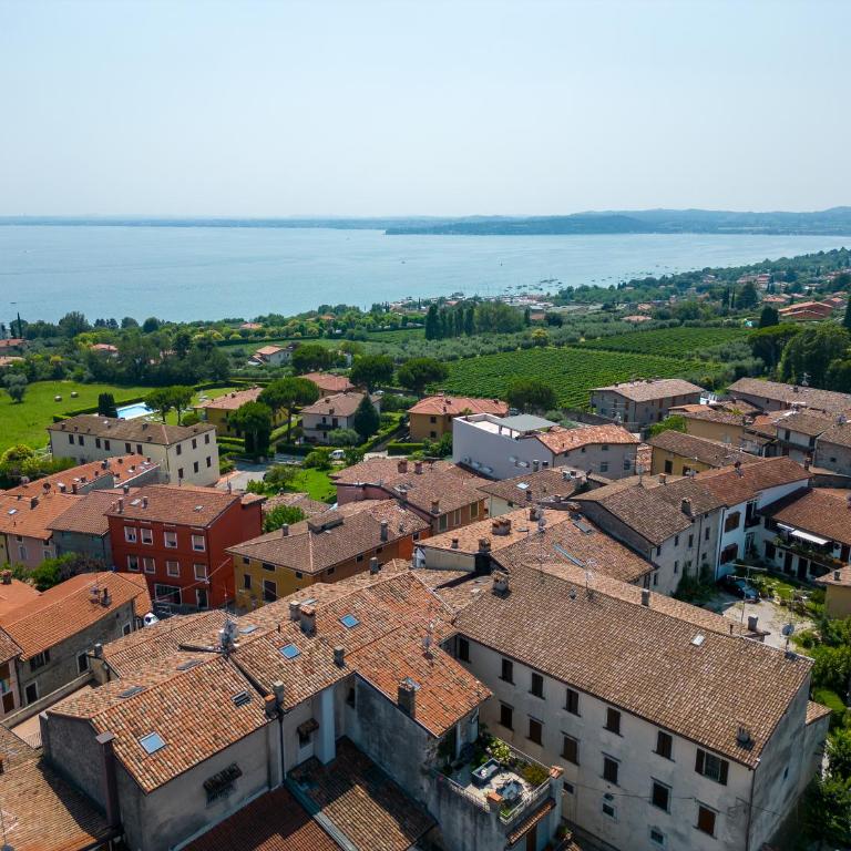 La casa di Monica con piscina e terrazza - Three-Bedroom Apartment with Balcony - 25