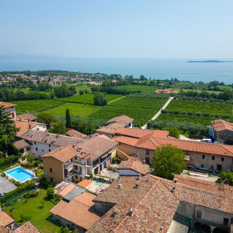 La casa di Monica con piscina e terrazza - Three-Bedroom Apartment with Balcony - 26