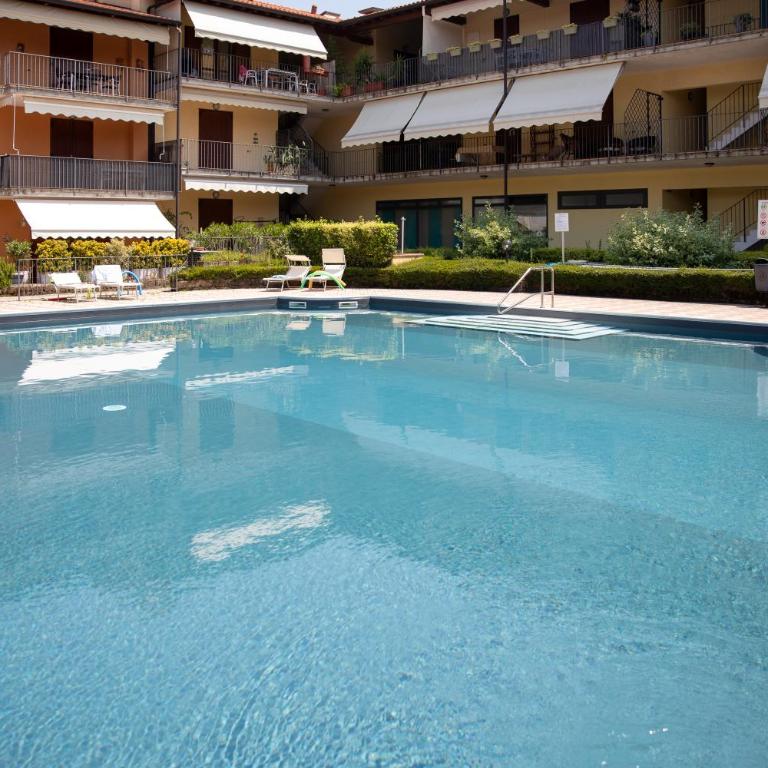 La casa di Monica con piscina e terrazza - Three-Bedroom Apartment with Balcony - 21