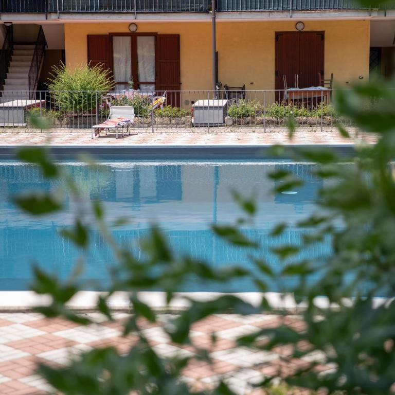 La casa di Monica con piscina e terrazza - Three-Bedroom Apartment with Balcony - 20