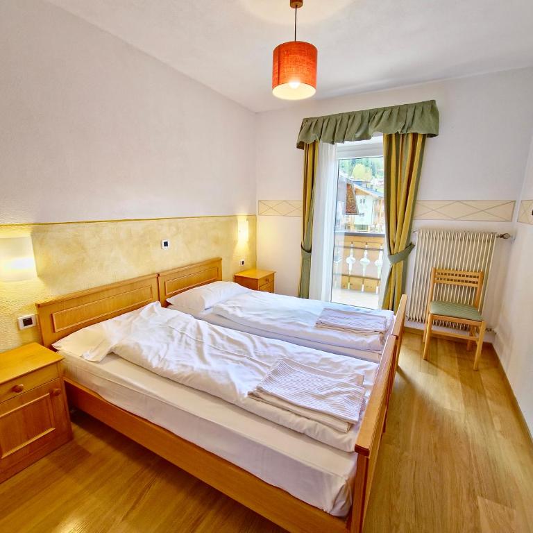 Appartamenti Villa Flora by AMA Val di Fassa - Appartamento Superior con 2 Camere da Letto - 3