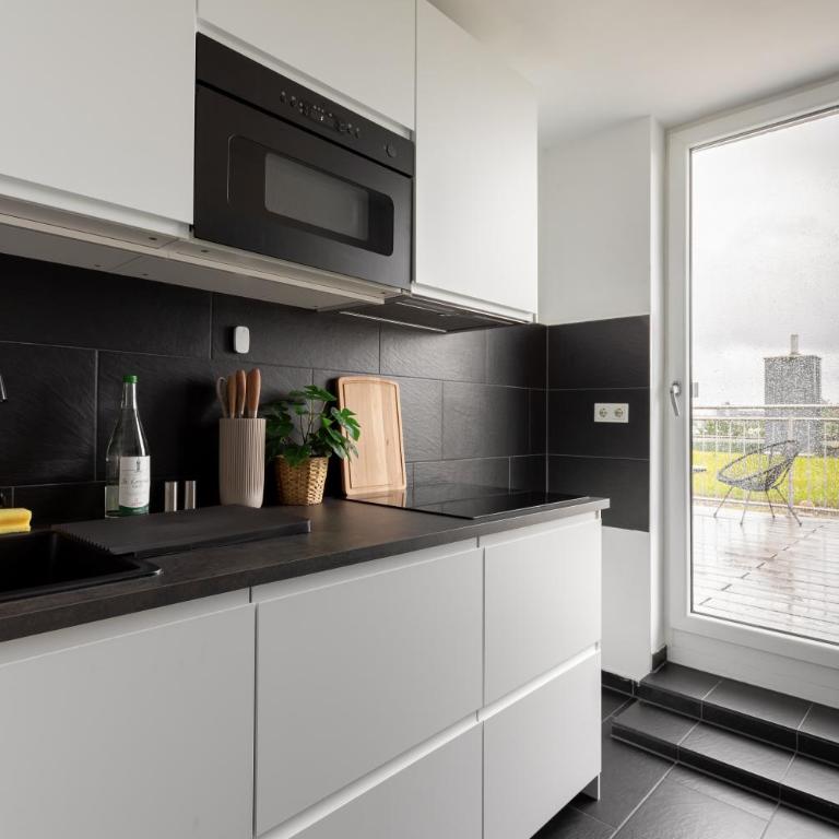 Global Living - Design Apartments I Terrace I Kitchen I Smart-TV I Parking space I München - Appartement 3 Chambres - 28