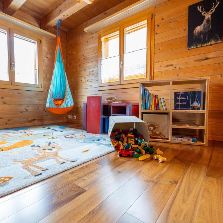 Chalet Regenbogen Familienapartment mit Indoor-Rutschbahn & Spieloase an der Fussgängerzone - Apartment mit 3 Schlafzimmern - 15