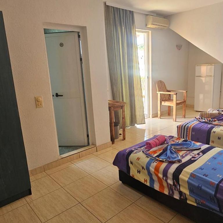 KIWI Apartments - Porodična Dvokrevetna Soba sa Bračnim Krevetom - 5