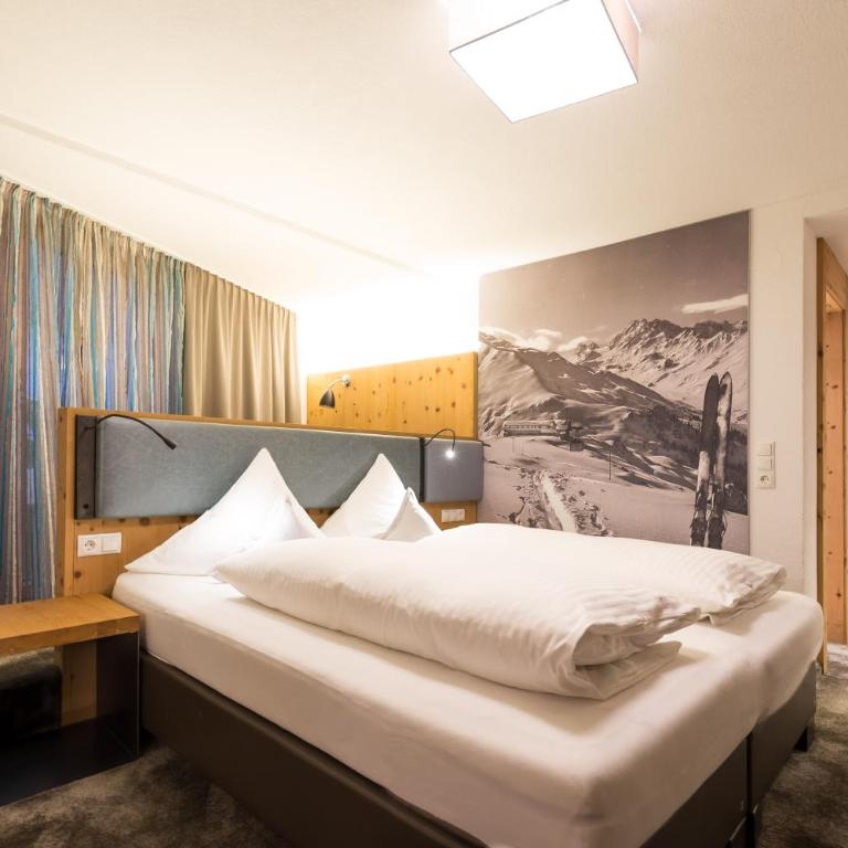 Hotel Piz Buin - Deluxe Vierbettzimmer - 2
