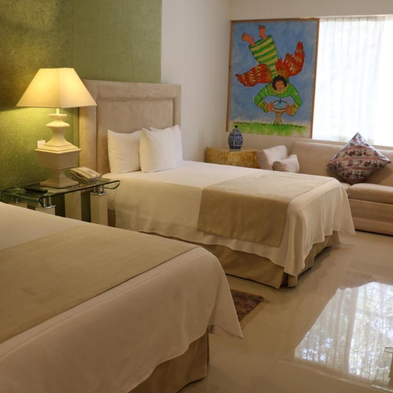 Hilton MM Grand Hotel Puebla, Tapestry Collection - Habitación Doble con ducha accesible en silla de ruedas - Adaptada para personas con problemas de movilidad/discapacidad auditiva - 2 camas dobles - 1