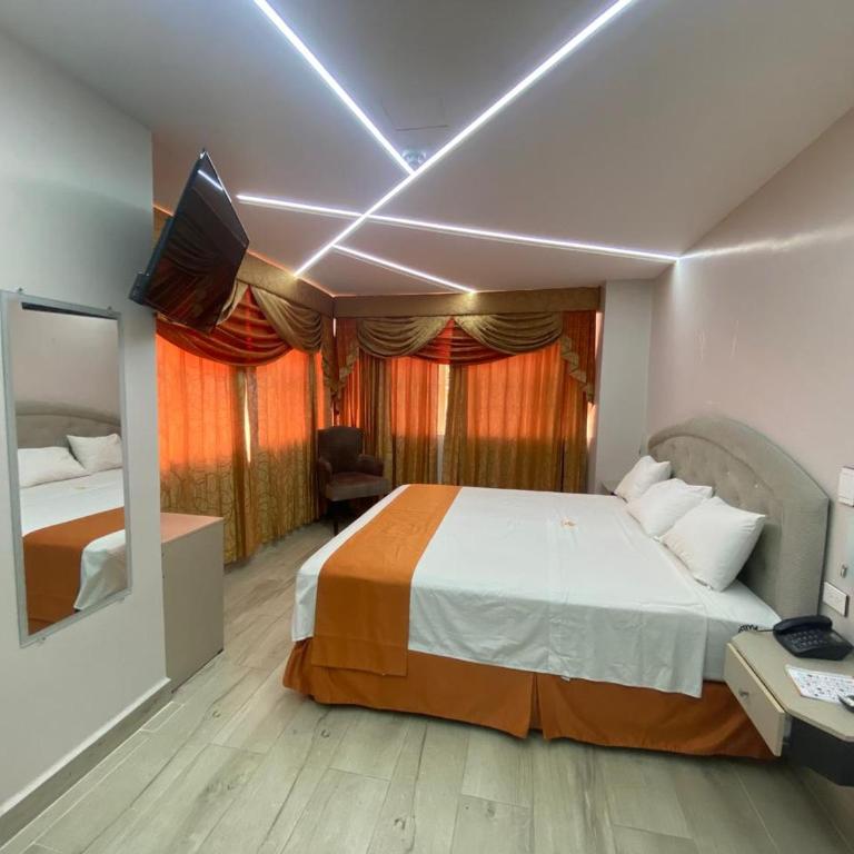 BRITNEY HOTEL Machala - Habitación Deluxe con cama extragrande - 1