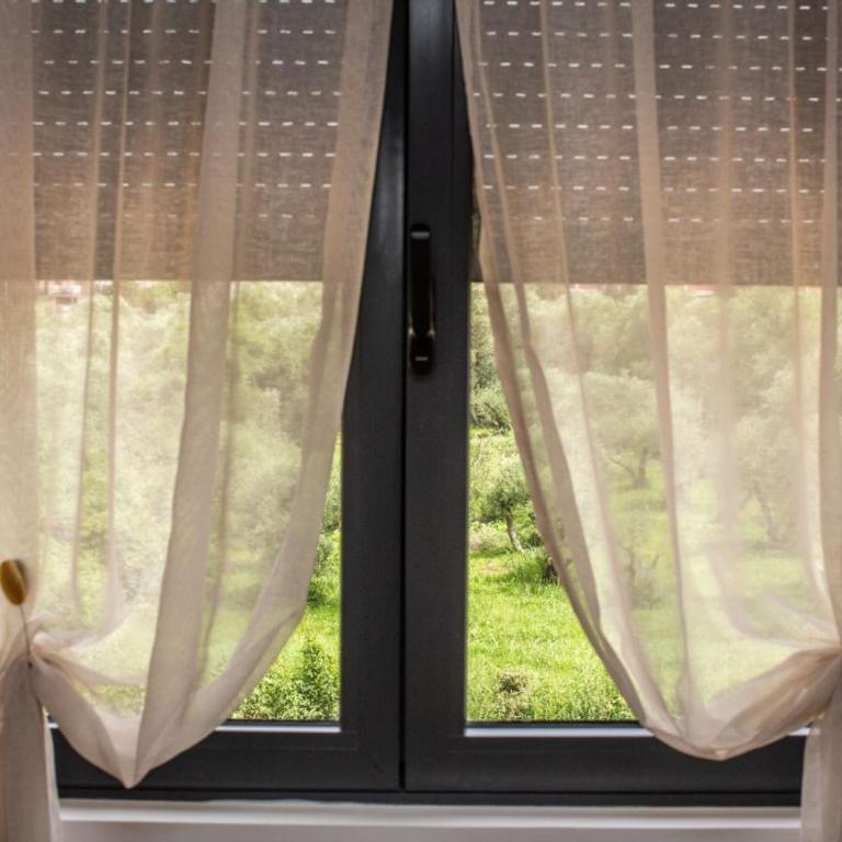 Apartments NIKOS FAMILY - Two-Bedroom Apartment with Garden View - 9