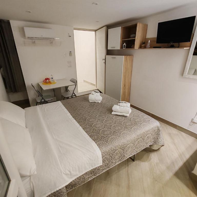 Holiday House - Camera Matrimoniale con Letto Supplementare - 2