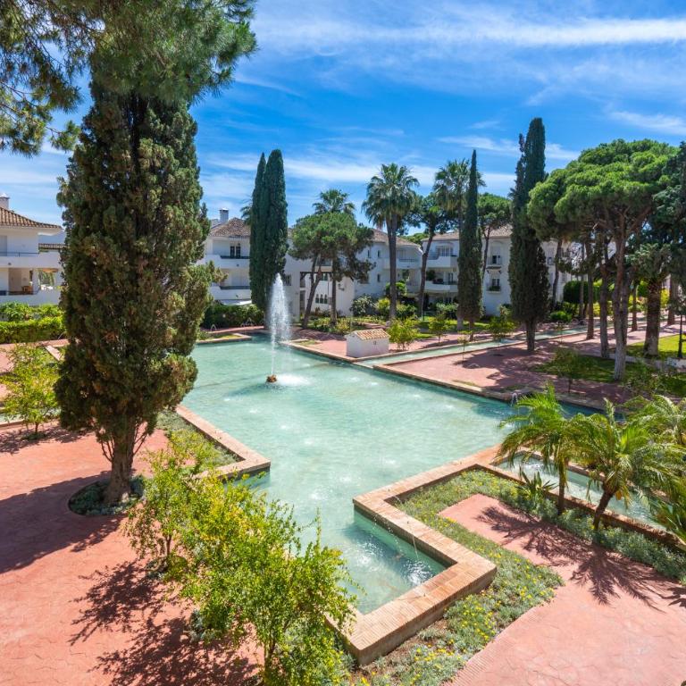 Elegant Marbella Apartment, 5-Pool Oasis, Sunlit Terrace, Garage - Two-Bedroom Apartment - 1