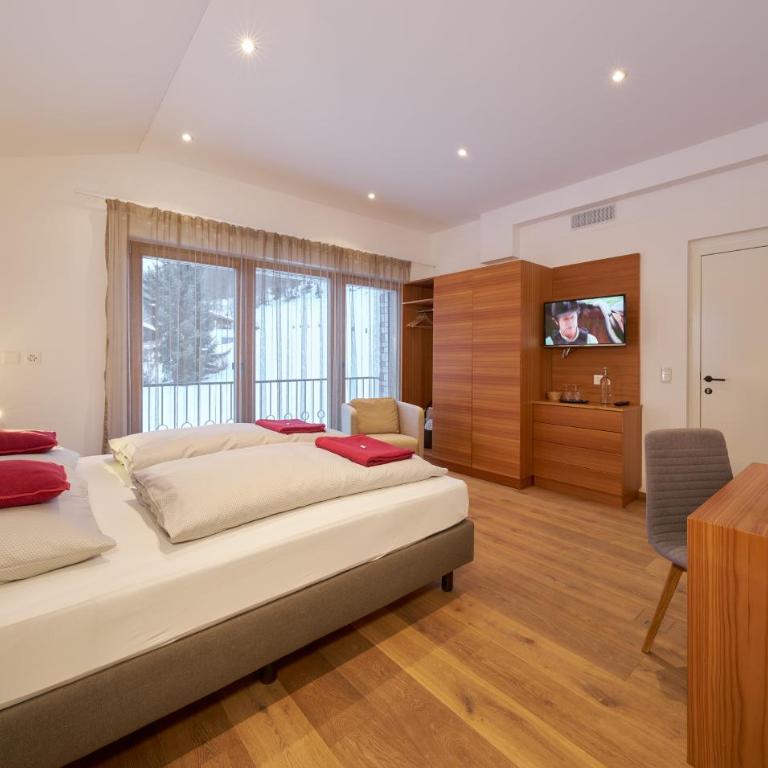 Grischuna Mountain Lodge - Deluxe Doppelzimmer mit Balkon - 1