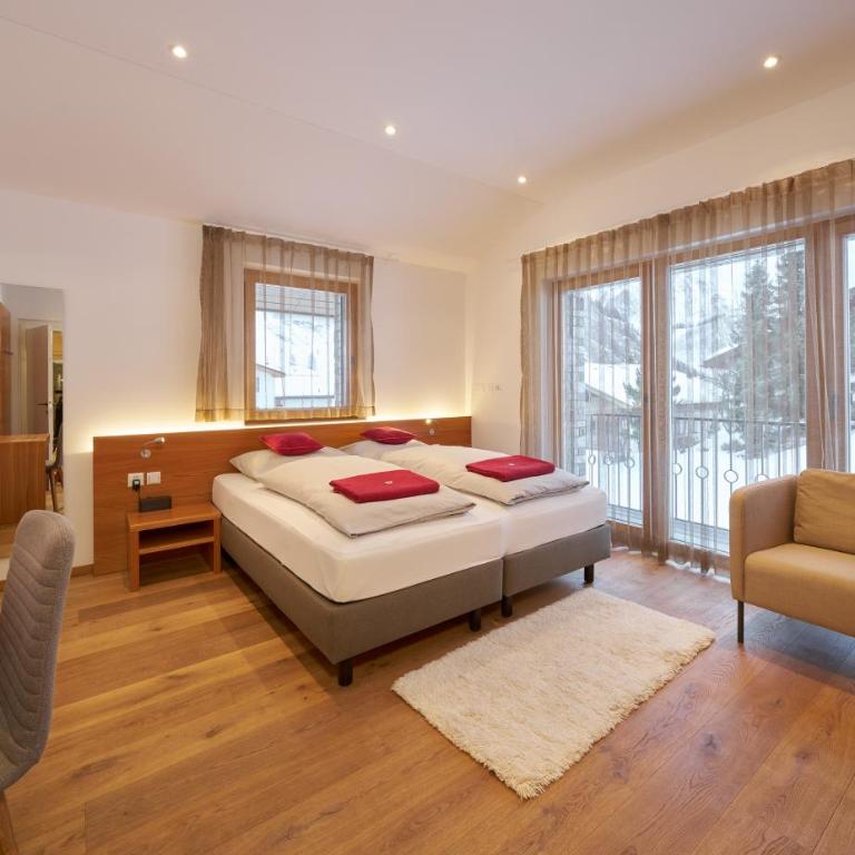 Grischuna Mountain Lodge - Deluxe Doppelzimmer mit Balkon - 7