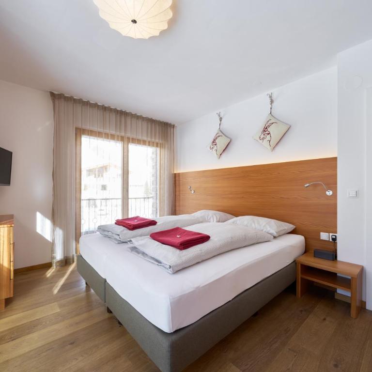 Grischuna Mountain Lodge - Apartment mit 2 Schlafzimmern mit Balkon und Terrasse - 12