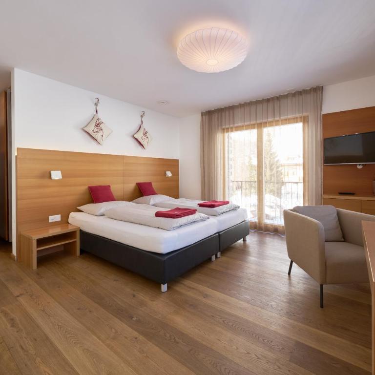 Grischuna Mountain Lodge - Apartment mit 2 Schlafzimmern mit Balkon und Terrasse - 13