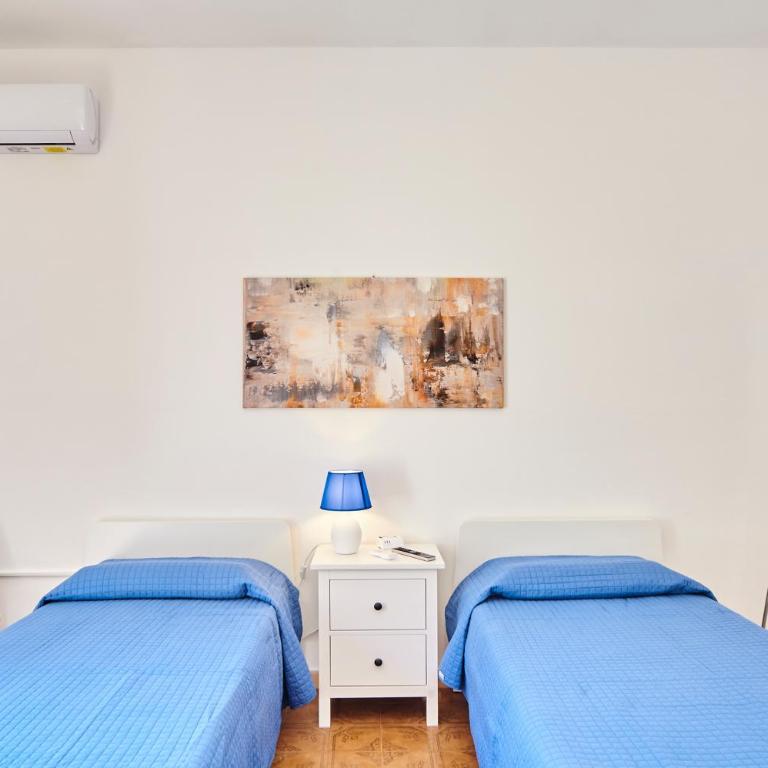 Tidu's home B&B - Camera Doppia con Letti Singoli con Servizi Igienici in Comune - 1